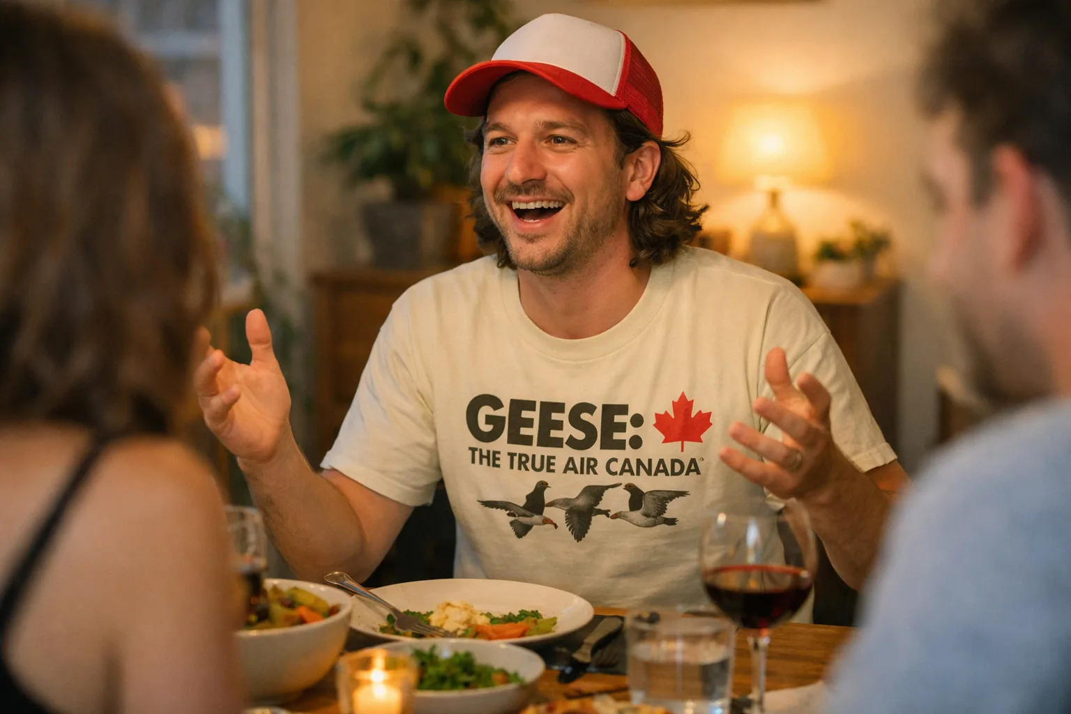 A person at a dinner table wearing the “Geese: The True Air Canada” shirt animatedly talking